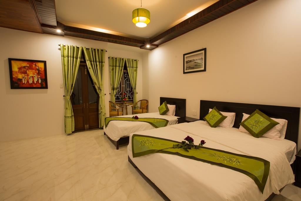 The Village Homestay Hoi An Værelse billede