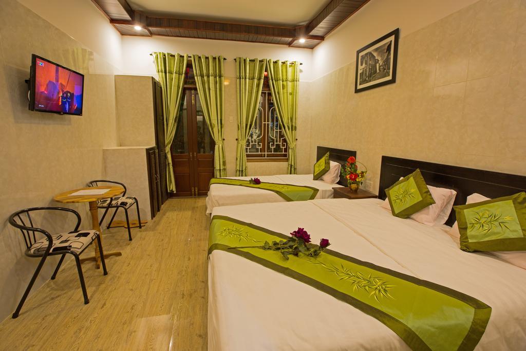 The Village Homestay Hoi An Værelse billede