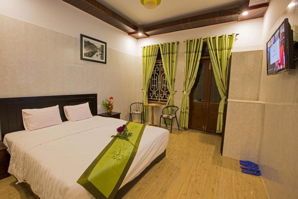 The Village Homestay Hoi An Værelse billede