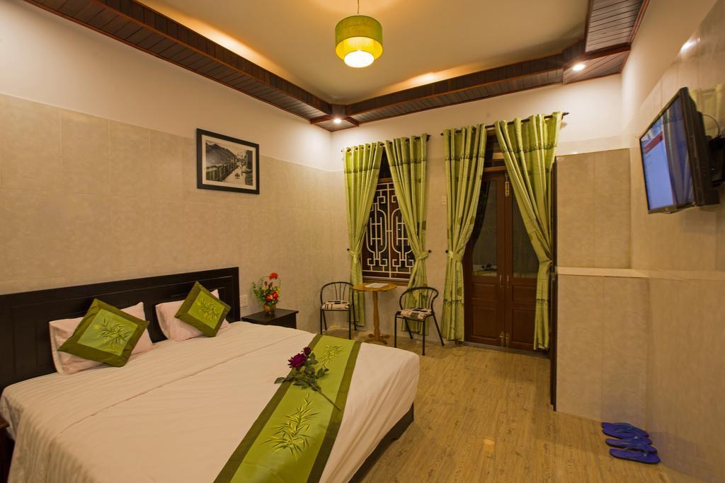 The Village Homestay Hoi An Værelse billede